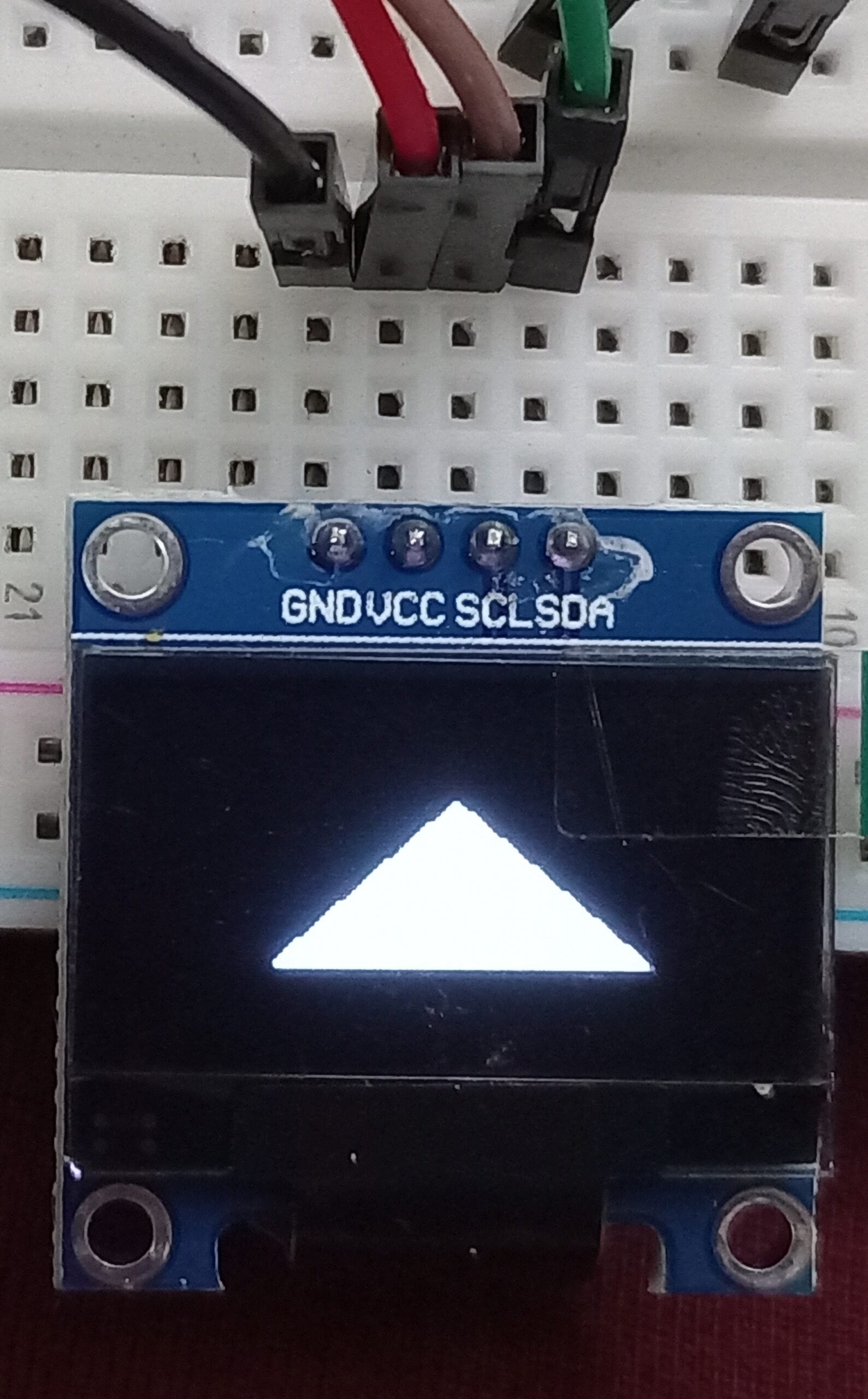 OLED display filled triangle